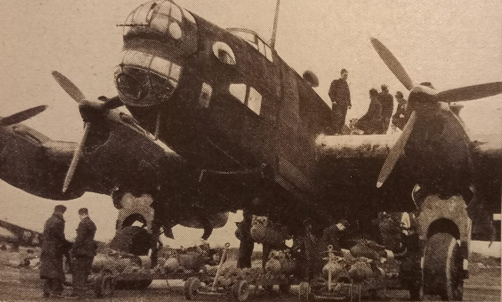 Bombs being loaded onto a Halifax Bomber 1941 WW2 Royal Air Force records